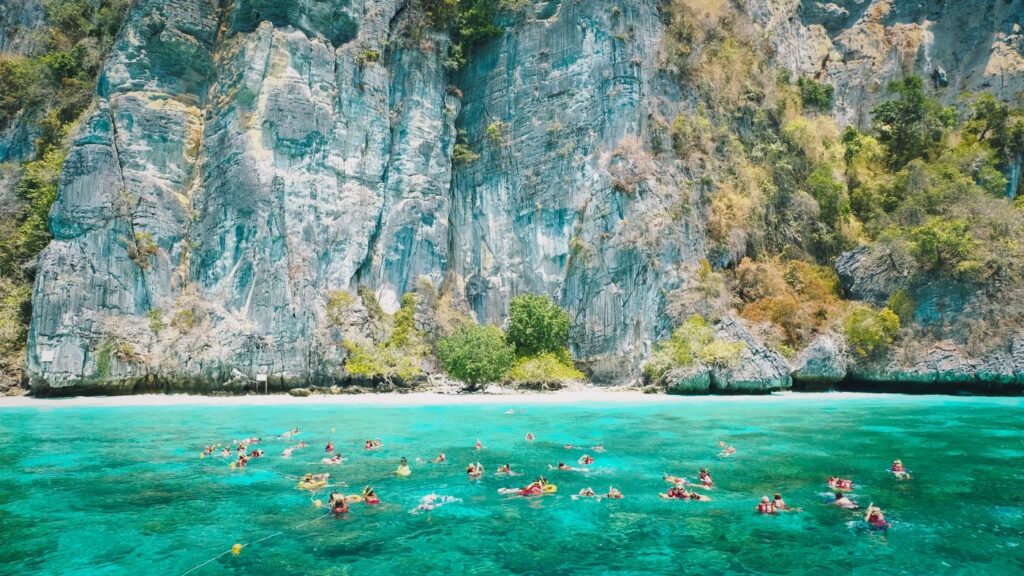 Tourists snorkeling at Phi Phi Island