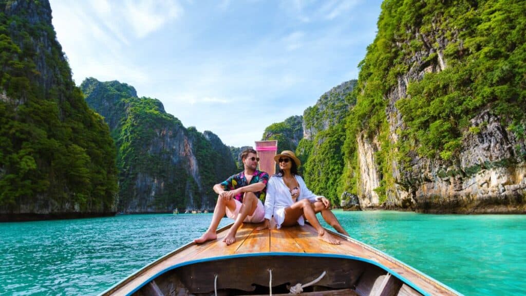 A couple on a longtail boat in Phi Phi Islands, Phuket