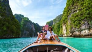 A couple on a longtail boat in Phi Phi Islands, Phuket